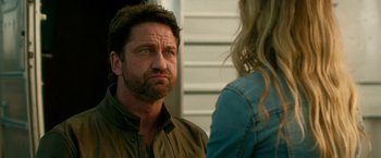 Movie still from “Geostorm” (2017), directed by Dean Devlin – A person talking to another person; Close Up shot, Over the shoulder angle