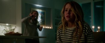 Movie still from “Geostorm” (2017), directed by Dean Devlin – A young girl is crying in front of a woman; Medium shot, Over the shoulder angle
