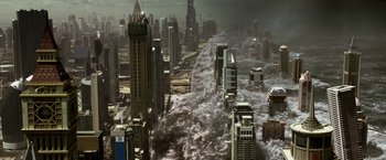 Movie still from “Geostorm” (2017), directed by Dean Devlin – An aerial view of a city with a cloud filled sky; Extreme Wide shot, High angle