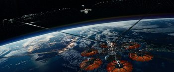 Movie still from “Geostorm” (2017), directed by Dean Devlin – An aerial view of the earth from a space station; Extreme Wide shot, High angle