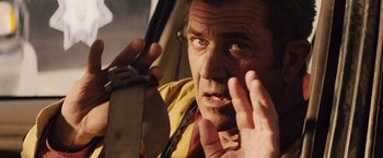 Movie still from “Get the Gringo” (2012), directed by Adrian Grunberg – A person holding a knife; Close Up shot, Over the shoulder angle