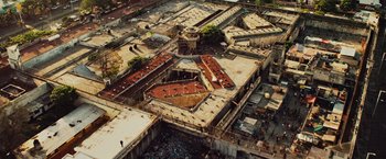 Movie still from “Get the Gringo” (2012), directed by Adrian Grunberg – An aerial view of an abandoned prison yard; Extreme Wide shot, Overhead angle