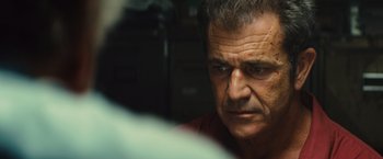 Movie still from “Get the Gringo” (2012), directed by Adrian Grunberg – A person looking at the camera; Close Up shot, Over the shoulder angle