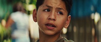 Movie still from “Get the Gringo” (2012), directed by Adrian Grunberg – A young boy's face; Close Up shot, Low angle