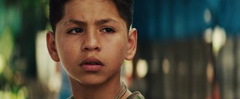 Movie still from “Get the Gringo” (2012), directed by Adrian Grunberg – A young boy's face; Close Up shot, Low angle