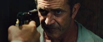 Movie still from “Get the Gringo” (2012), directed by Adrian Grunberg – A person with a beard; Close Up shot, Over the shoulder angle