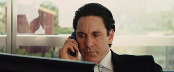 Movie still from “Get the Gringo” (2012), directed by Adrian Grunberg – A person talking on a cell phone; Close Up shot, Over the shoulder angle