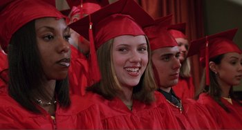 Movie still from “Ghost World” (2001), directed by Terry Zwigoff – A group of people in graduation robes and caps; Close Up shot, High angle