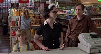 Movie still from “Ghost World” (2001), directed by Terry Zwigoff – A group of people standing in a store; Medium shot, Over the shoulder angle