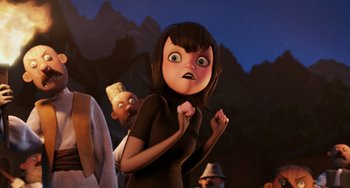 Movie still from “Hotel Transylvania” (2012), directed by Genndy Tartakovsky – An animated woman with her mouth wide open; Medium shot, Over the shoulder angle