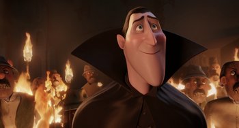 Movie still from “Hotel Transylvania” (2012), directed by Genndy Tartakovsky – A man in a black coat and a man in a brown hat; Close Up shot, Low angle