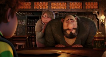 Movie still from “Hotel Transylvania” (2012), directed by Genndy Tartakovsky – A woman and a man are standing at a table; Medium shot, Low angle
