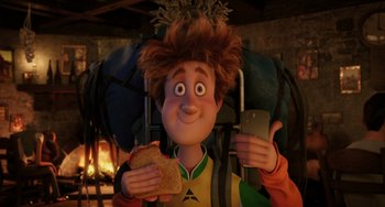 Movie still from “Hotel Transylvania” (2012), directed by Genndy Tartakovsky – A person holding a piece of bread in their hands; Medium shot, High angle