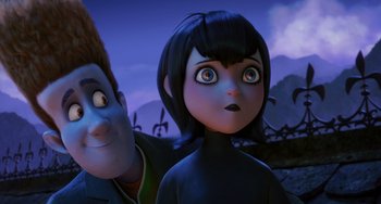 Movie still from “Hotel Transylvania” (2012), directed by Genndy Tartakovsky – A couple of people that are standing next to each other; Close Up shot, Over the shoulder angle