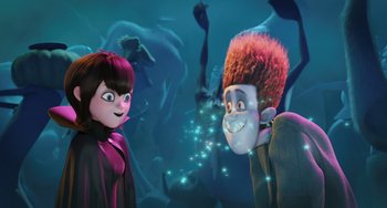 Movie still from “Hotel Transylvania” (2012), directed by Genndy Tartakovsky – A woman standing next to a man with a red hair wig; Medium shot, Over the shoulder angle