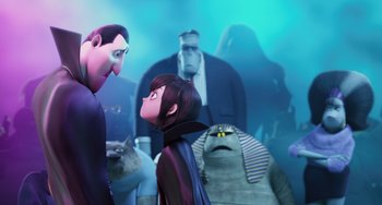 Movie still from “Hotel Transylvania” (2012), directed by Genndy Tartakovsky – A group of people standing in front of each other in a room; Medium shot, Over the shoulder angle