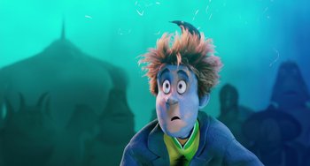 Movie still from “Hotel Transylvania” (2012), directed by Genndy Tartakovsky – A cartoon of a man with a surprised look on his face; Close Up shot, High angle