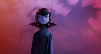 Movie still from “Hotel Transylvania” (2012), directed by Genndy Tartakovsky – A girl with a black dress and a black bat on her head; Medium shot, Over the shoulder angle