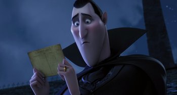 Movie still from “Hotel Transylvania” (2012), directed by Genndy Tartakovsky – A person holding an envelope; Close Up shot, Low angle