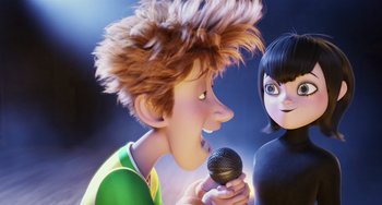 Movie still from “Hotel Transylvania” (2012), directed by Genndy Tartakovsky – A boy and a girl sing a song together; Close Up shot, Over the shoulder angle