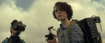 Movie still from “Ghostbusters: Afterlife” (2021), directed by Jason Reitman – A person holding a cell phone in their hands; Close Up shot, Low angle