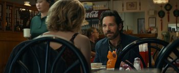Movie still from “Ghostbusters: Afterlife” (2021), directed by Jason Reitman – A man and a woman are sitting at a table; Close Up shot, Over the shoulder angle