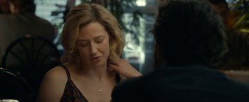 Movie still from “Ghostbusters: Afterlife” (2021), directed by Jason Reitman – A woman is looking at a man with a necklace; Close Up shot, Over the shoulder angle