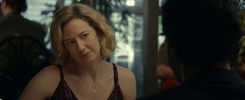 Movie still from “Ghostbusters: Afterlife” (2021), directed by Jason Reitman – A person sitting in front of a window; Close Up shot, Over the shoulder angle