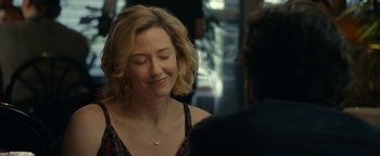 Movie still from “Ghostbusters: Afterlife” (2021), directed by Jason Reitman – A person sitting down with their eyes closed; Close Up shot, Over the shoulder angle