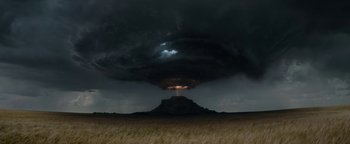 Movie still from “Ghostbusters: Afterlife” (2021), directed by Jason Reitman – A supercell thunderstorm is seen in the distance; Extreme Wide shot, Low angle