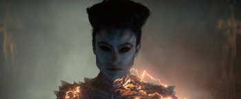 Movie still from “Ghostbusters: Afterlife” (2021), directed by Jason Reitman – A woman with a strange makeup and hair style; Close Up shot, High angle