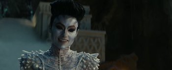 Movie still from “Ghostbusters: Afterlife” (2021), directed by Jason Reitman – A person wearing a costume; Close Up shot, Over the shoulder angle