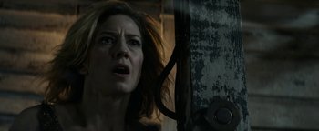 Movie still from “Ghostbusters: Afterlife” (2021), directed by Jason Reitman – A person looking at the camera; Close Up shot, Low angle