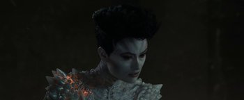 Movie still from “Ghostbusters: Afterlife” (2021), directed by Jason Reitman – A person wearing a dress; Close Up shot, Low angle