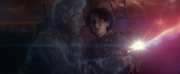 Movie still from “Ghostbusters: Afterlife” (2021), directed by Jason Reitman – A man and a woman are looking at each other; Close Up shot, Over the shoulder angle