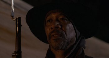 Movie still from “Glory” (1989), directed by Edward Zwick – A person wearing a hat; Close Up shot, Low angle