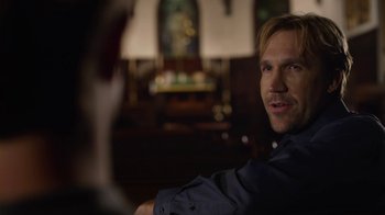 Movie still from “God's Not Dead” (2014), directed by Harold Cronk – A person sitting in a room; Close Up shot, Over the shoulder angle