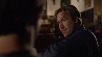 Movie still from “God's Not Dead” (2014), directed by Harold Cronk – A person sitting in a chair; Close Up shot, Over the shoulder angle