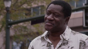 Movie still from “God's Not Dead” (2014), directed by Harold Cronk – A person wearing a shirt; Close Up shot, Low angle