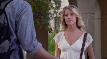 Movie still from “God's Not Dead” (2014), directed by Harold Cronk – A woman in a white dress looking at a man in a gray shirt; Close Up shot, Over the shoulder angle