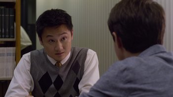 Movie still from “God's Not Dead” (2014), directed by Harold Cronk – A young man sitting in front of a mirror talking to another young man; Close Up shot, Over the shoulder angle