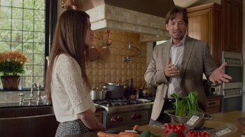 Movie still from “God's Not Dead” (2014), directed by Harold Cronk – A man and a woman standing in front of a counter; Medium shot, Over the shoulder angle