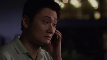 Movie still from “God's Not Dead” (2014), directed by Harold Cronk – A man is talking on a cell phone at night; Close Up shot, Over the shoulder angle