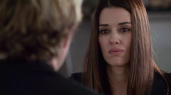 Movie still from “God's Not Dead” (2014), directed by Harold Cronk – A woman looking at a man in front of a mirror; Close Up shot, Over the shoulder angle