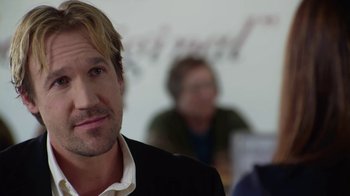 Movie still from “God's Not Dead” (2014), directed by Harold Cronk – A person wearing a suit and tie; Close Up shot, Over the shoulder angle