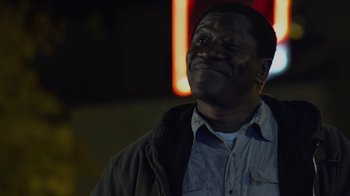 Movie still from “God's Not Dead” (2014), directed by Harold Cronk – A man with a beard is looking up at the sky; Close Up shot, Low angle