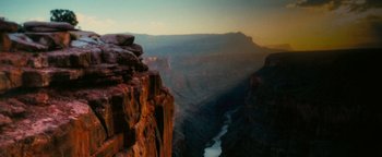 Movie still from “How to Be Single” (2016), directed by Christian Ditter – A view of a river flowing through a canyon; Extreme Wide shot, Low angle