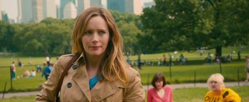 Movie still from “How to Be Single” (2016), directed by Christian Ditter – A woman standing in front of another woman in a park; Close Up shot, Over the shoulder angle