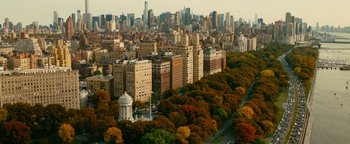 Movie still from “How to Be Single” (2016), directed by Christian Ditter – An aerial view of a large city with tall skyscrapers; Extreme Wide shot, High angle