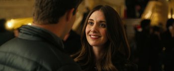 Movie still from “How to Be Single” (2016), directed by Christian Ditter – A woman smiling at a man in a black shirt; Close Up shot, Over the shoulder angle